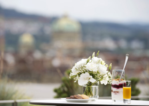 Summer cocktail over the roofs of Berne