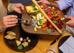 Christmas party with aperitif, fondue or raclette